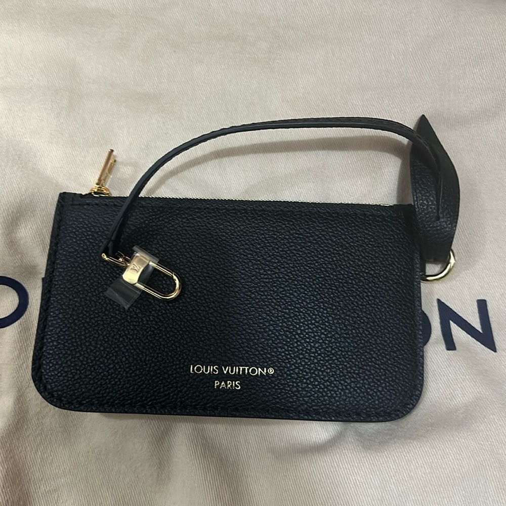Brand new Louis Vuitton wristlet